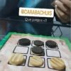 Jugando al Pogo de Carabachuis en Santa Fe, juego estratégico y de bolsillo